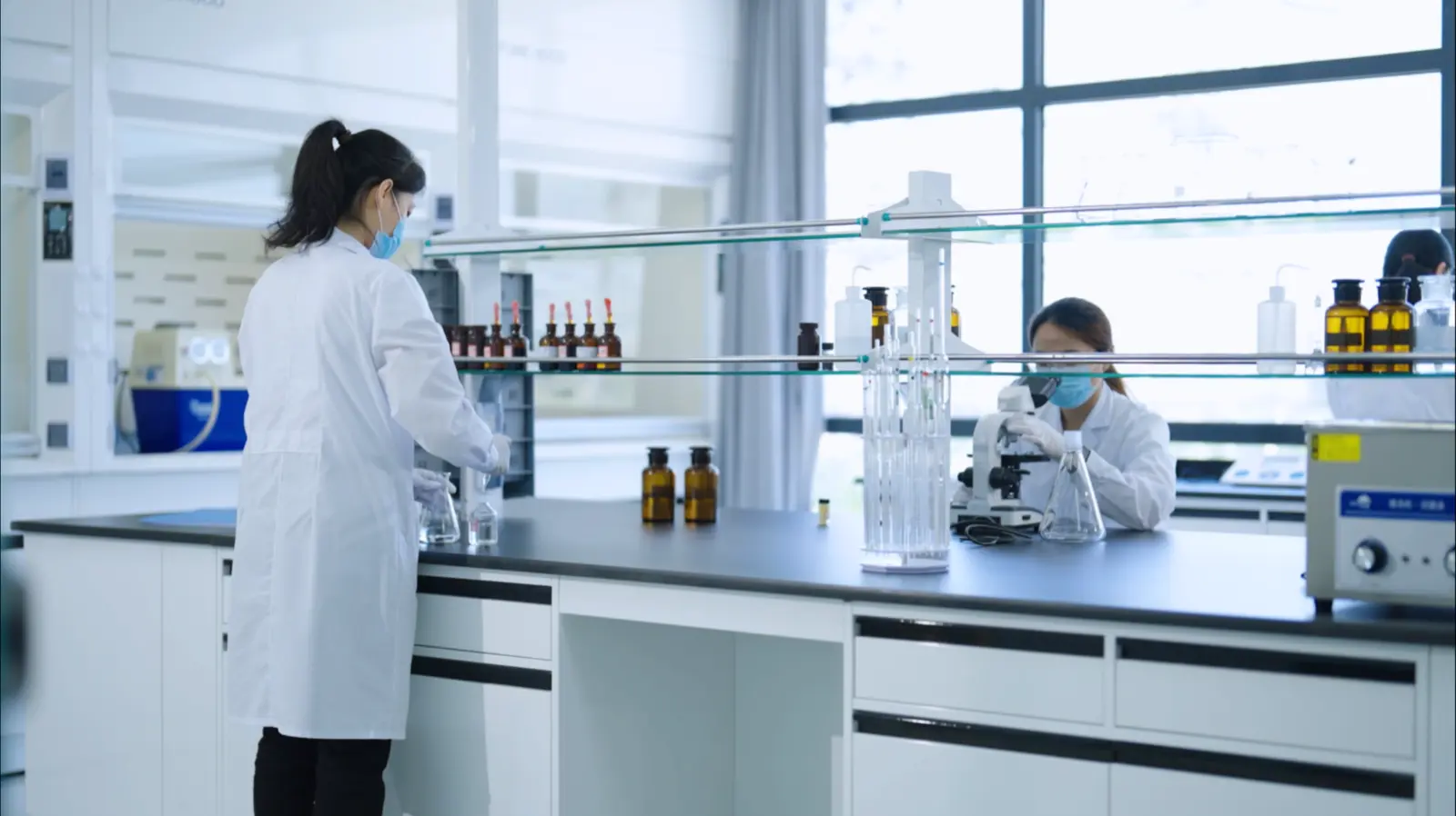 Benstarpet scientists working in a modern quality-control laboratory